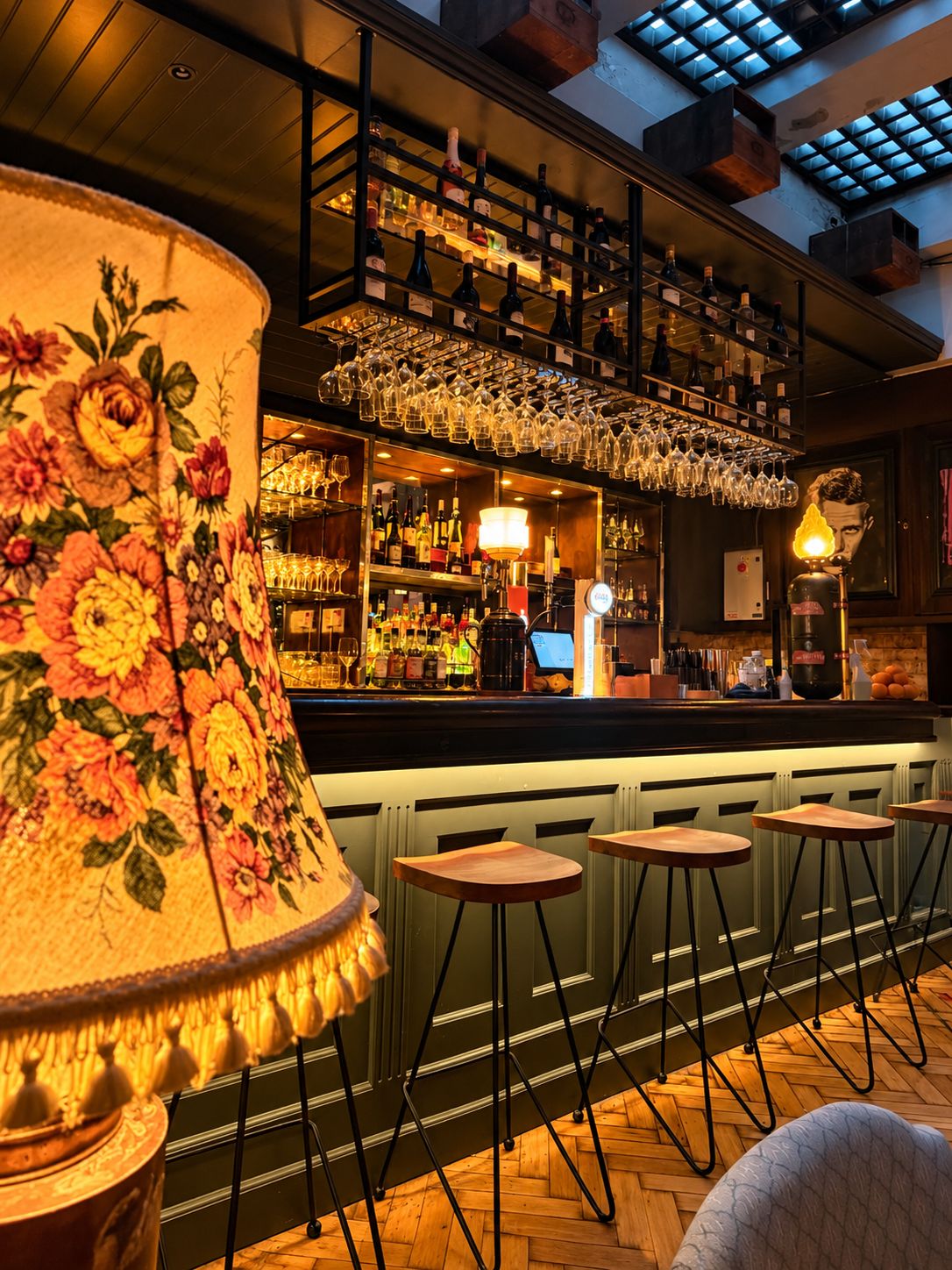 The bar, a floral lamp in the foreground