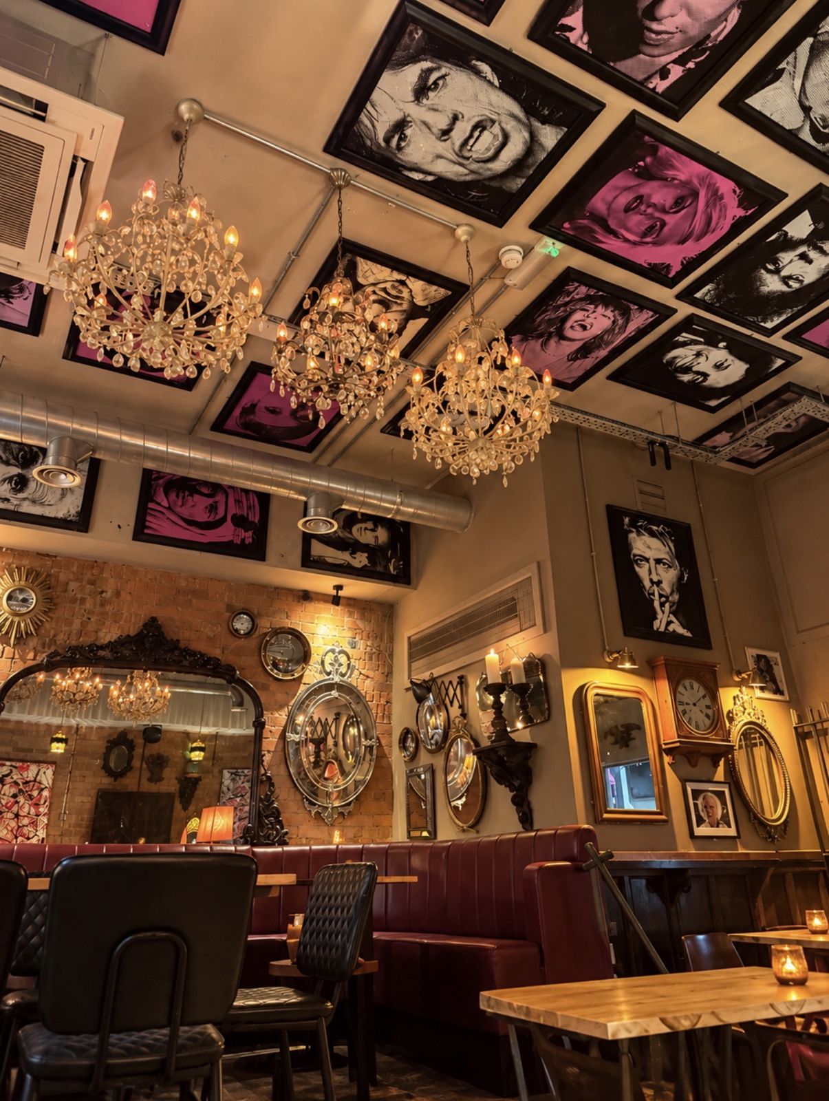 Chandeliers and a ceiling of rock and roll portraits